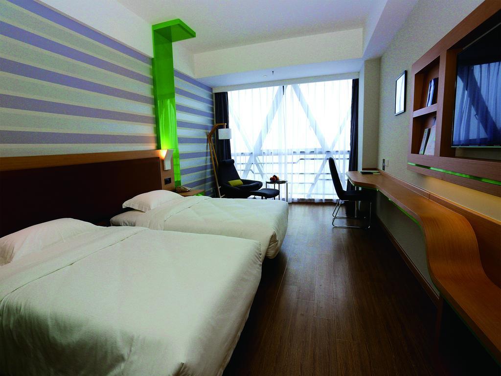 Hotel Ibis Styles Nantong Wuzhou International Plaza Habitación foto